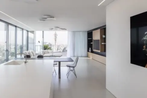 Luxurious living room in an ultra‑premium mini‑penthouse at Gindi Sarona, featuring elegant design and open views.