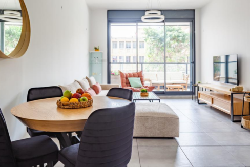 Bright luxury living room in a 4-room garden apartment in the Gindi TLV project