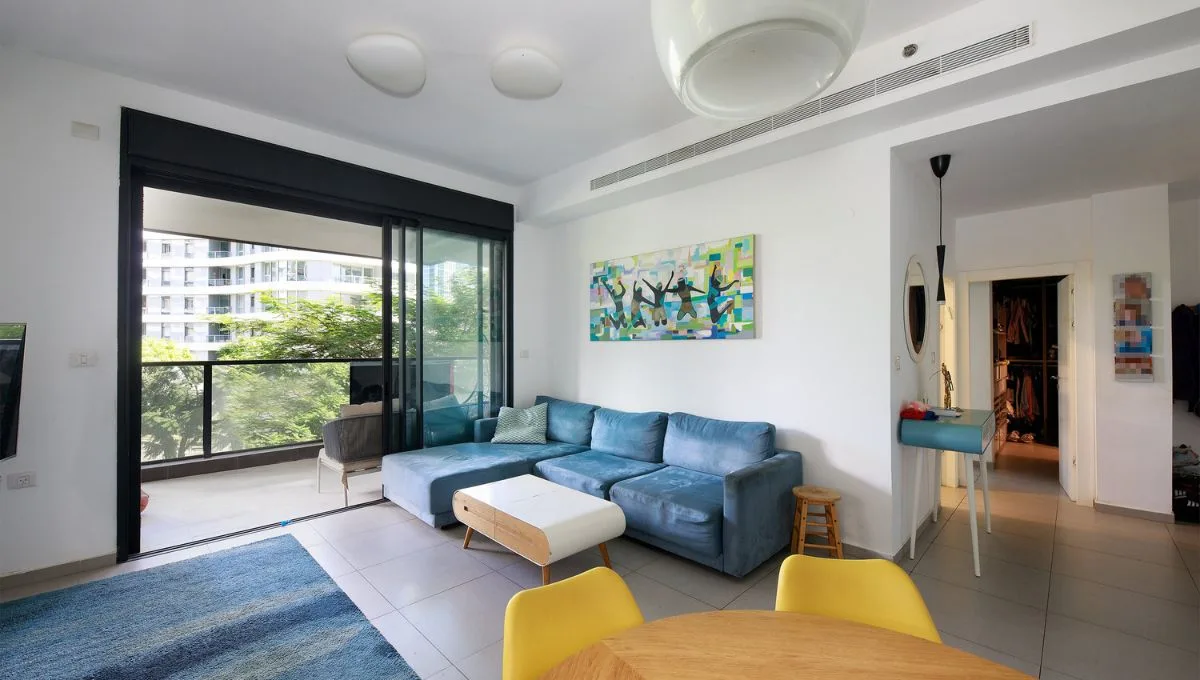 Spacious living room in Gindi Tel Aviv apartment with modern design